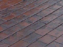 Cobblestone Stamped Concrete - Brick Red Base - Dark Grey Highlight